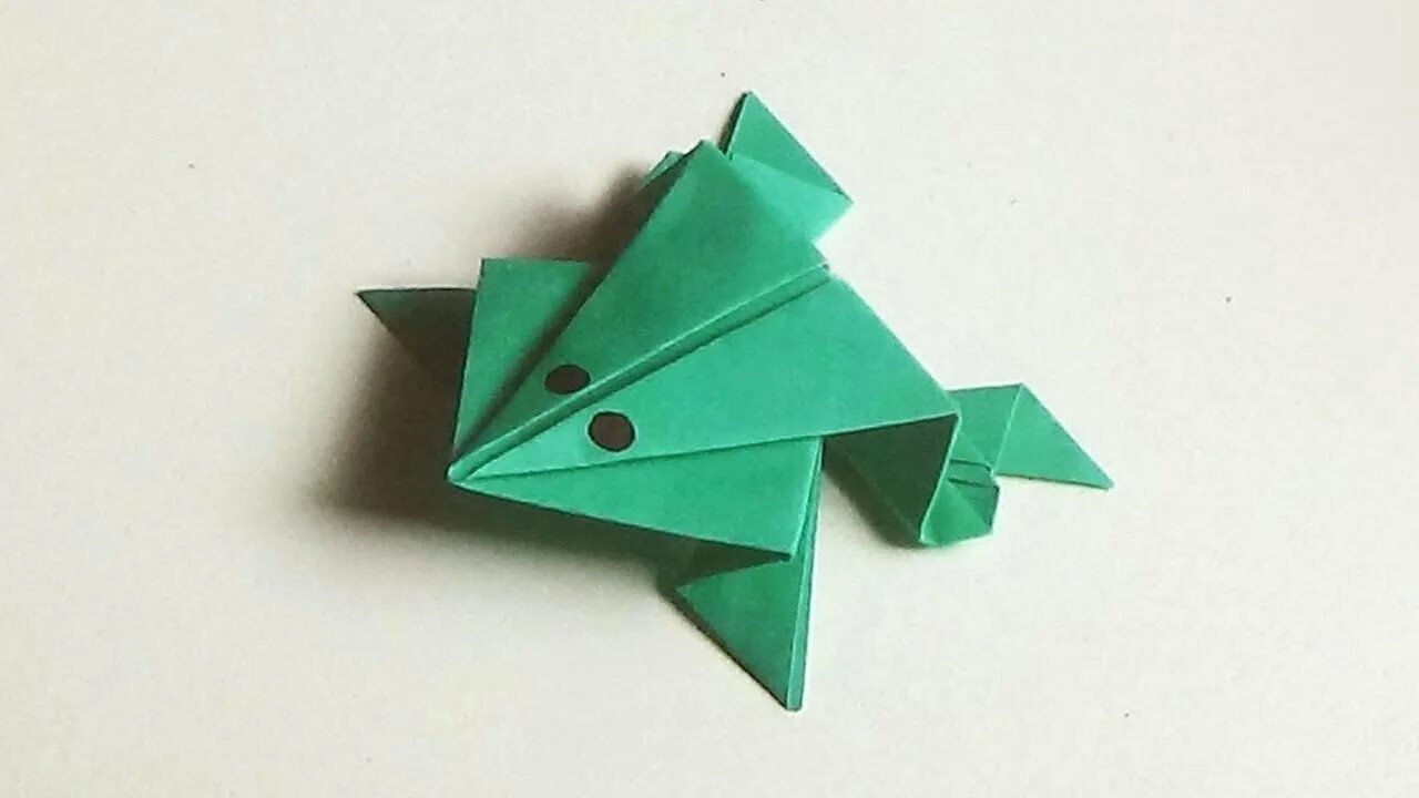 Оригами лягушка из бумаги 2 класс математика. Лягушка из бумаги. Оригами лягушка из бумаги. Конструирование из бумаги лягушка. Лягушка из бумаги прыгающая.
