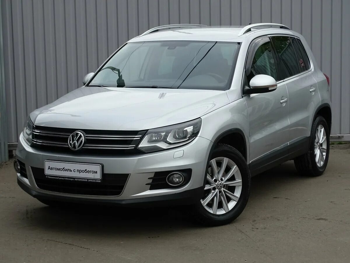 Volkswagen tiguan 2014. Фольксваген Тигуан Рестайлинг 2014. Volkswagen Тигуан 2014. Машина Фольксваген Тигуан 2014. ТИГУАНФОЛЬЦВАГЕН Тигуан 2014.