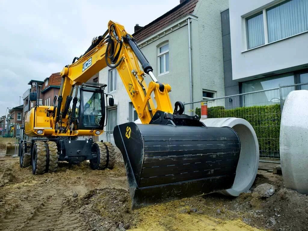 Аренда экскаватора погрузчика vyvoz musora24. Колесный экскаватор JCB js 130w. Экскаватор JCB 130 W колесный. Колесный экскаватор JCB js 145w. JCB 145 колесный экскаватор.