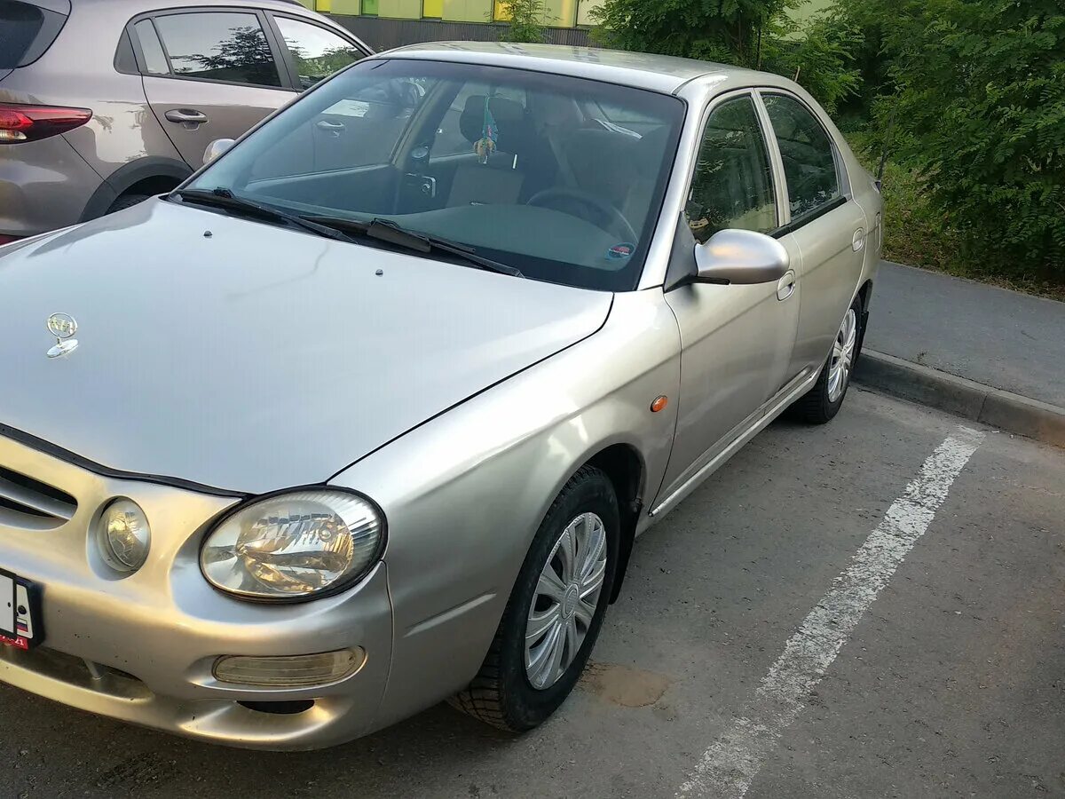 Купить б/у Kia Shuma I 1.5 MT (88 л.с.) бензин механика в Москве: бежевый Киа Шу