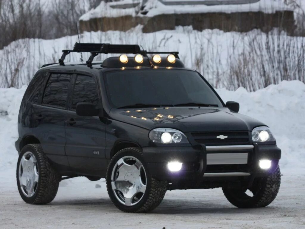 Шнива установка. Chevrolet Niva. Chevrolet Niva 2123. Chevrolet Liva. Тюнингованная Шеви Нива.