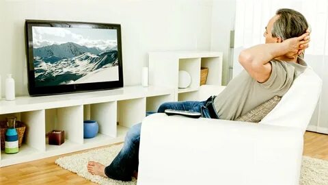 He is watching tv at the moment