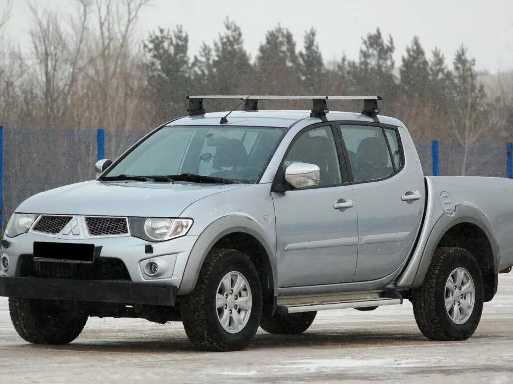 Мицубиси l200 купить. Mitsubishi l200 МТ. Митсубиси л200 2011. Мицубиси л200 2011 года. Митсубиси l200 2011 года.