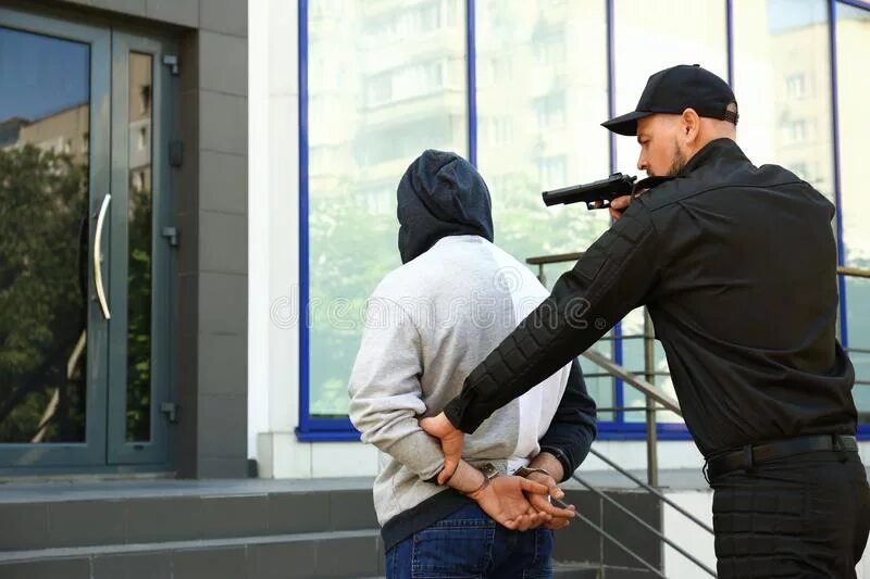 Полицейский сток. Arrest me девушка. Полиция стоковое фото. While the policeman out of the window. Traffic policeman stopping a driver.