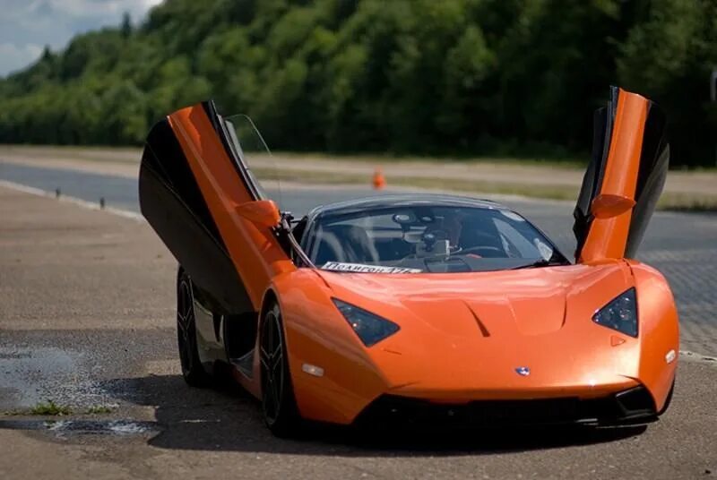 Mclaren mp4-12c 2011. Тонкая машина. Mclaren 12c coupe. 2011 mclaren 12c coupe. Самый плоский автомобиль.