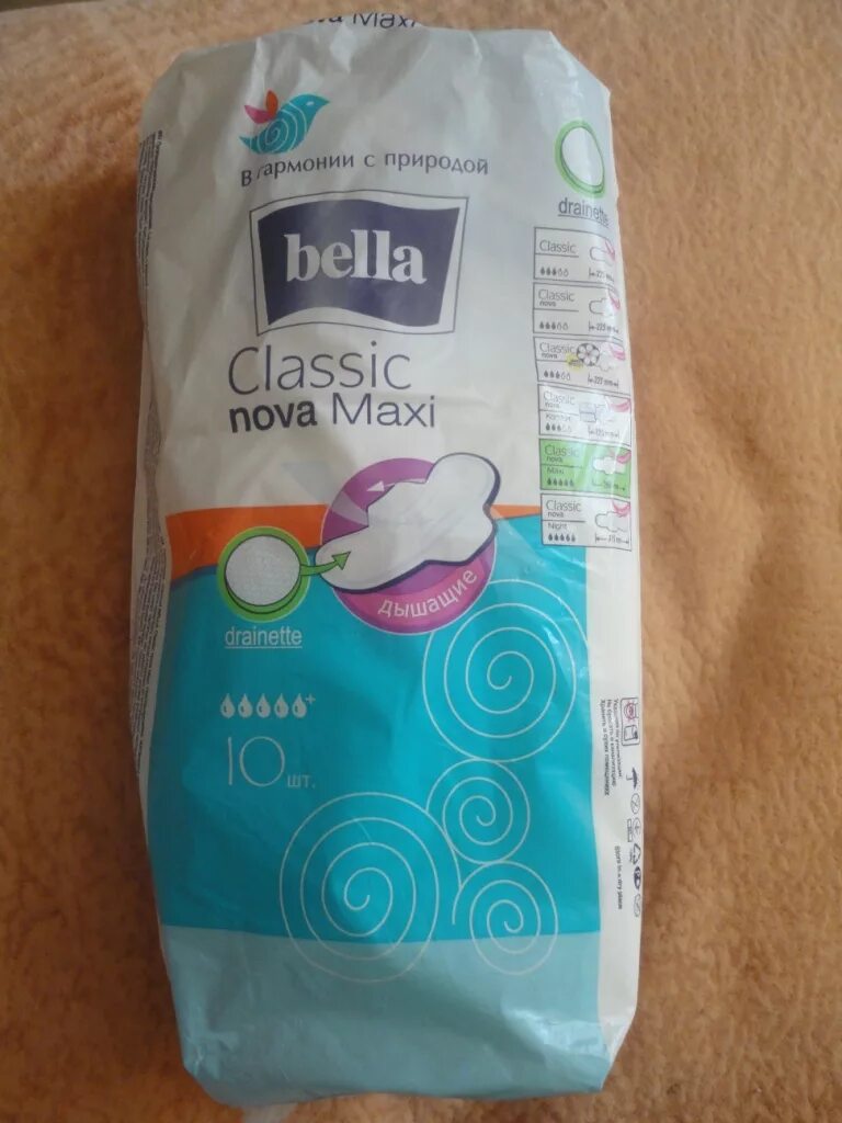 Bella nova maxi. Bella прокладки Classic Nova Maxi. Послеродовые прокладки Bella. Прокладки Bella пухлые.