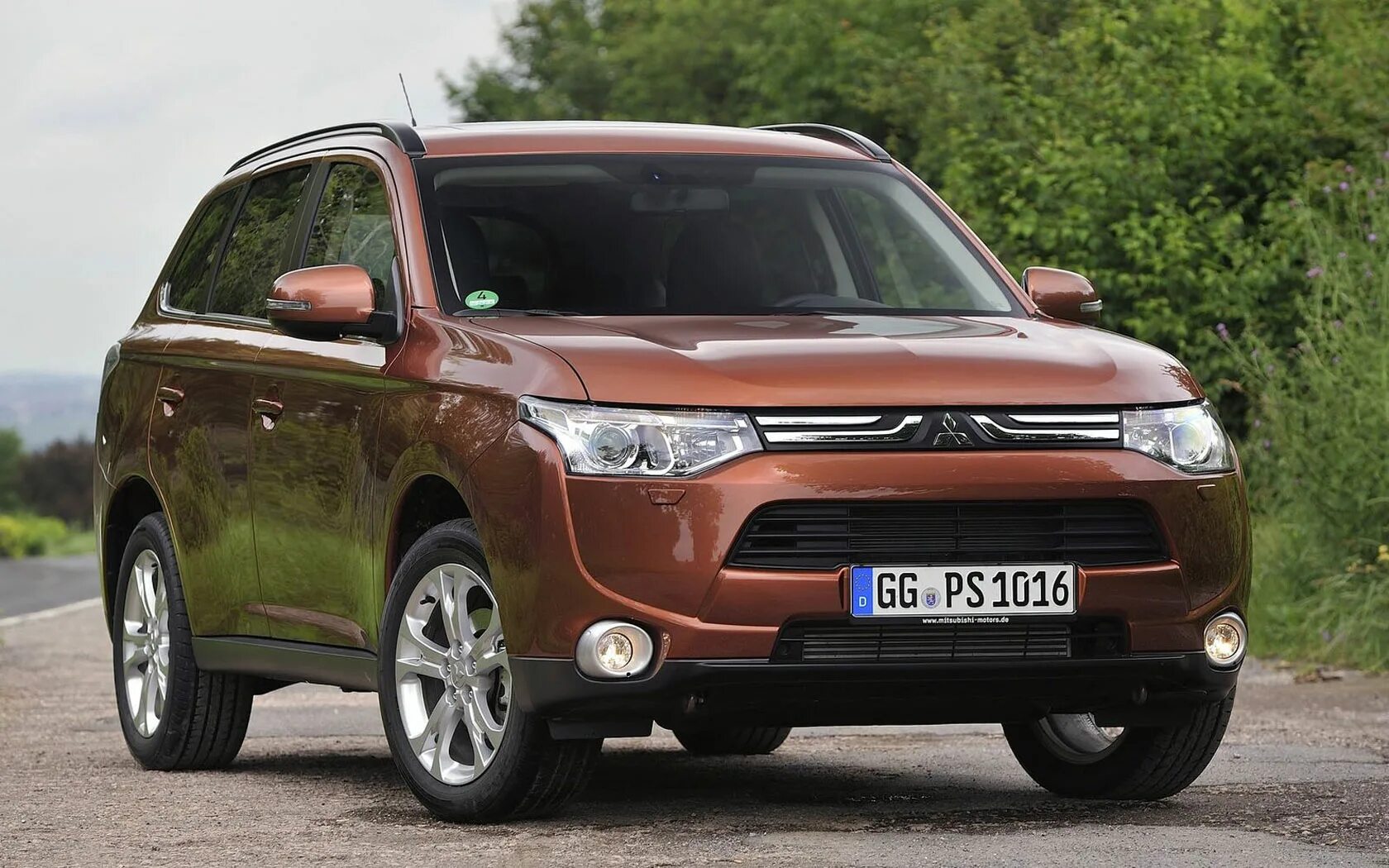 Сколько стоит мицубиси аутлендер. Мицубиси Аутлендер 3. Mitsubishi Outlander 2013. Mitsubishi Outlander Mitsubishi Outlander. Мицубиси Аутлендер 2013.