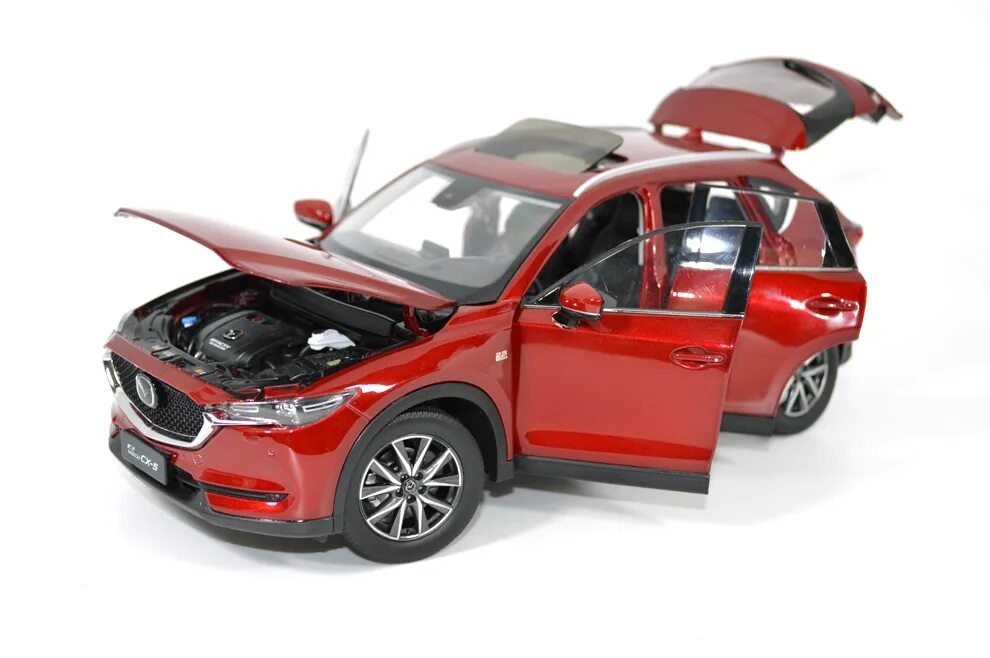 Mazda cx7 1:18 Paudi. Мазда СХ-5 моделька игрушечная. Масштабная модель Mazda CX-5. Моделька Mazda CX-5. Mazda машинки