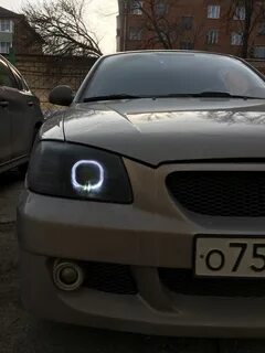 Линзованные фары акцент