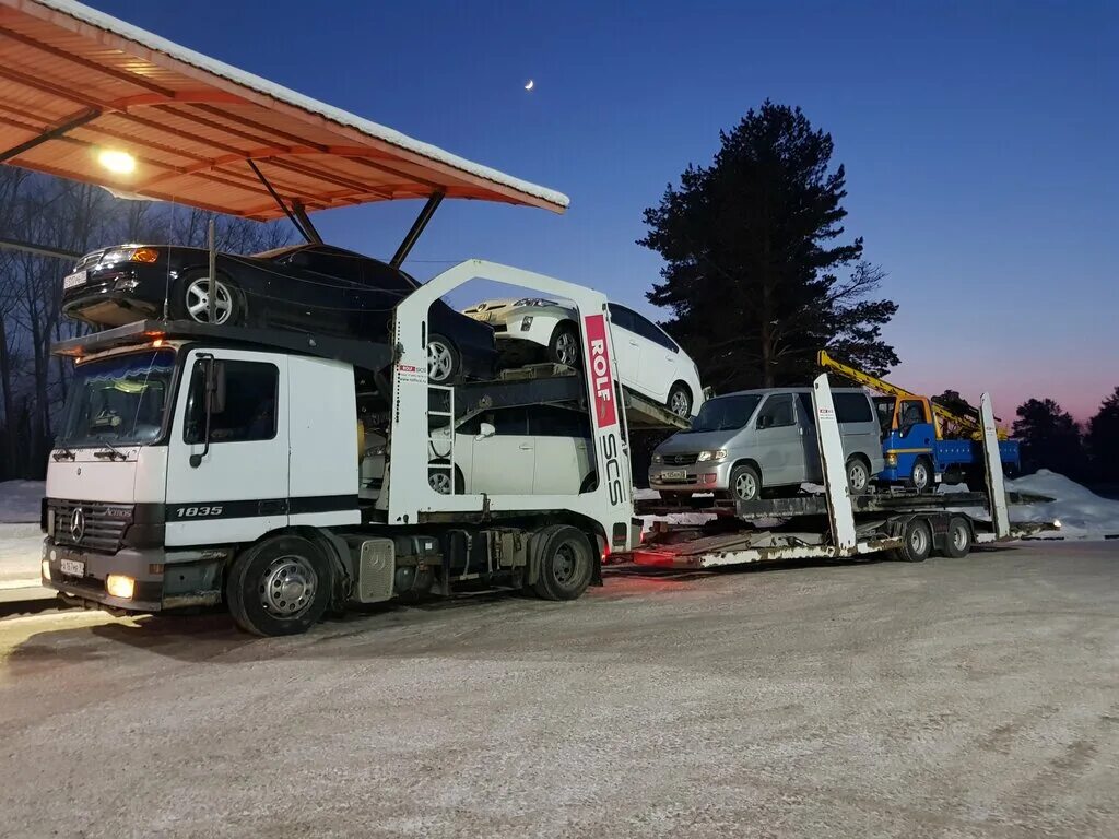 Фаворит авто иркутск. 32. Автосервис фаворит заполярный. Автотехцентр фаворит авто логотип. Автовоз фото с машинами.