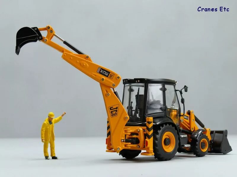 Куплю экскаватор jcb 3cx. Модель экскаватора JCB 3cx. JCB 3cx Motorart 1/50. Масштабная модель экскаватора погрузчика JCB 3cx 1/50. Модель JCB 3cx игрушка.