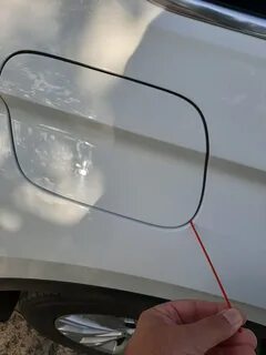 Открытие лючка бензобака тигуан