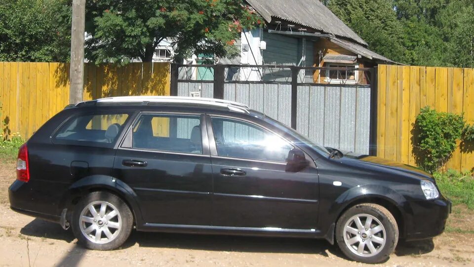 Лачетти универсал 2012. Chevrolet Lacetti универсал черный вид сбоку. Хром окантовка стекол Лачетти универсал. Тюнинг Шевроле Лачетти универсал своими руками. Стойки амортизатора Шевроле Лачетти универсал Мондо отзывы.