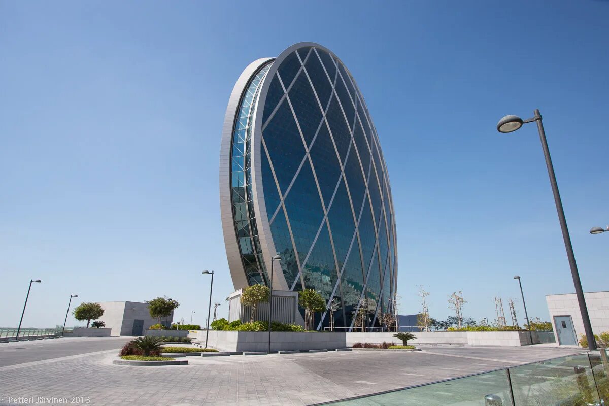 Round build. Aldar hq в Абу-Даби. Небоскреб «Aldar hq” в Абу Даби. Абу Даби круглое здание. Круглый небоскреб в Абу Даби.