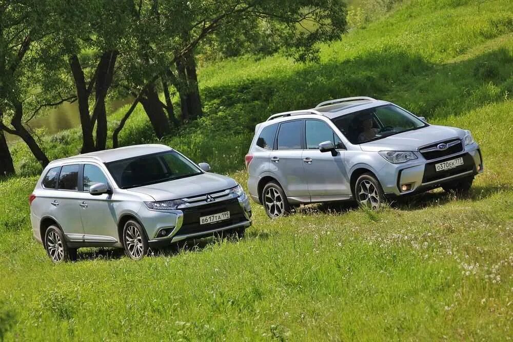 Subaru Forester 2021. Subaru Forester vs Mitsubishi Outlander. Мицубиси Субару Форестер.