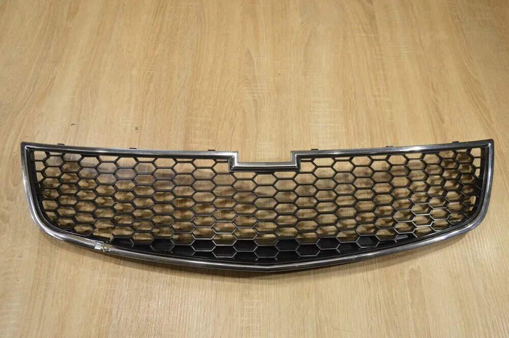 Решетка радиатора шевроле. Решетка радиатора aveo t250. Решетка радиатора шевроле авео т250 артикул. Решетка радиатора лачетти хэтчбек 2007. Решетка радиатора шевроле авео т250.