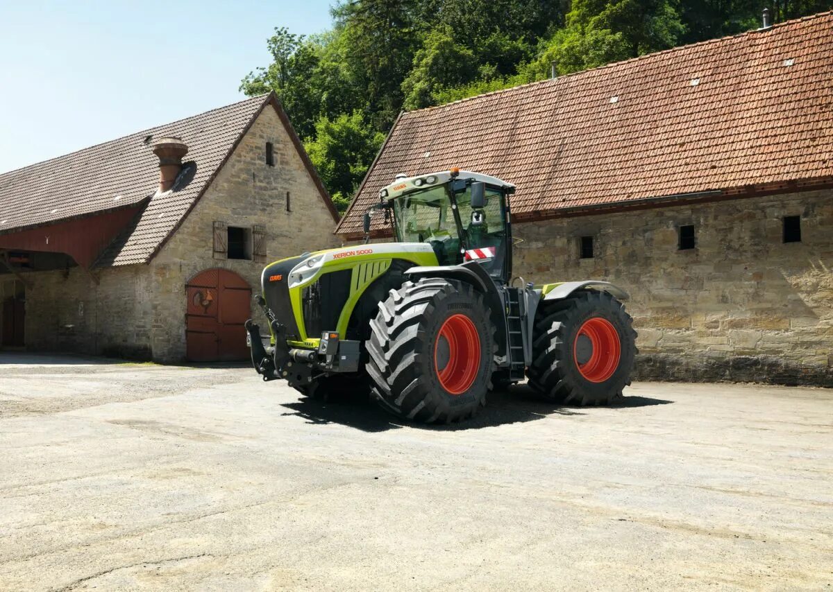 Клаас. Трактор CLAAS Xerion. CLAAS Xerion 5000 Crane. Класс Ксерион 4500. Класс Ксерион 9000.