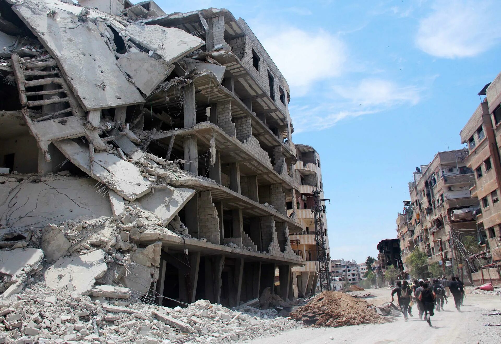 Damage to the building was. Damaged building. to damage. damage to a building in bam. damage.