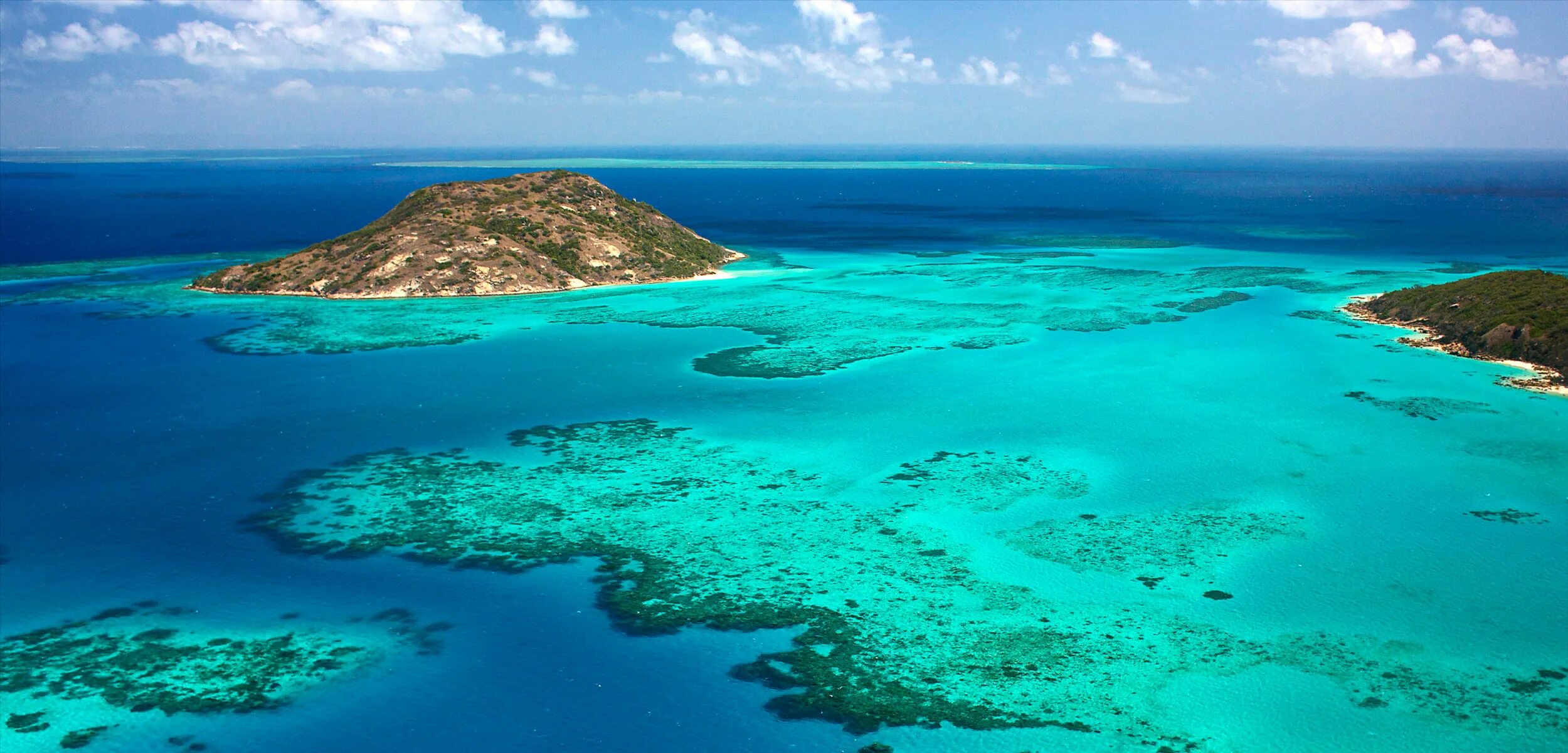 Барьерный риф в Австралии. Большой коралловый риф в Австралии. Большой Барьерный риф национальный парк. Коралловое море Барьерный риф. Происхождение островов австралии