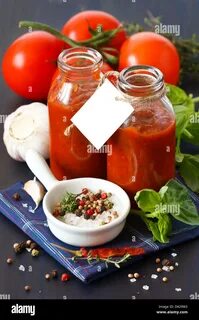 Traditional homemade tomato sauce with empty name tag and ingredients Stock...