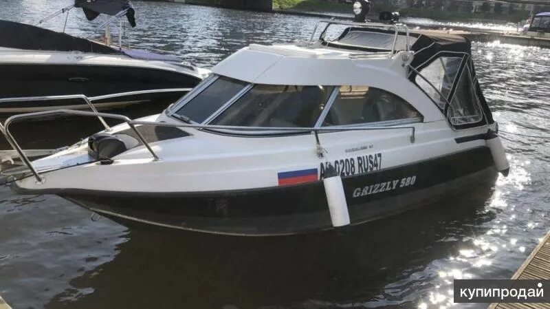 Лодка grizzly 580 ht. Катер гризли 580. Grizzly 580. Катера гризли бу. Катера гризли бу.