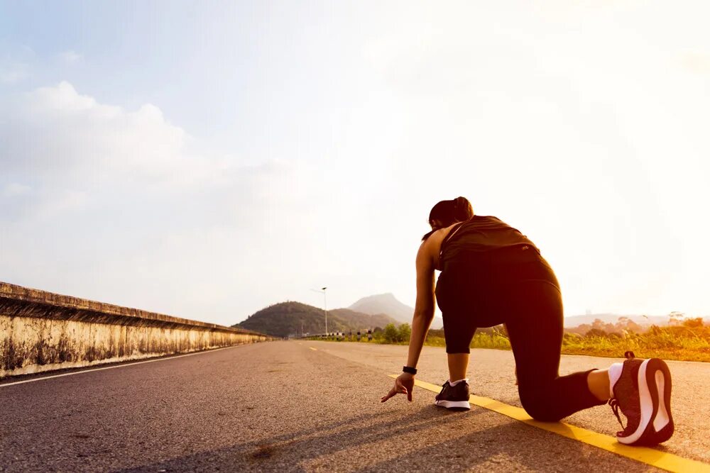 Going to the run year. Going to the run. ready to run. start road running. running position.