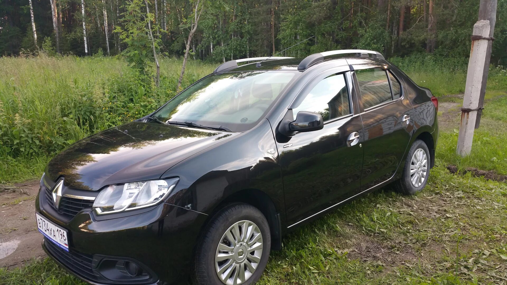 Рейлинги на крышу Renault Logan с 2014 "Комфорт" Pt Group Серебристые - Автобокс