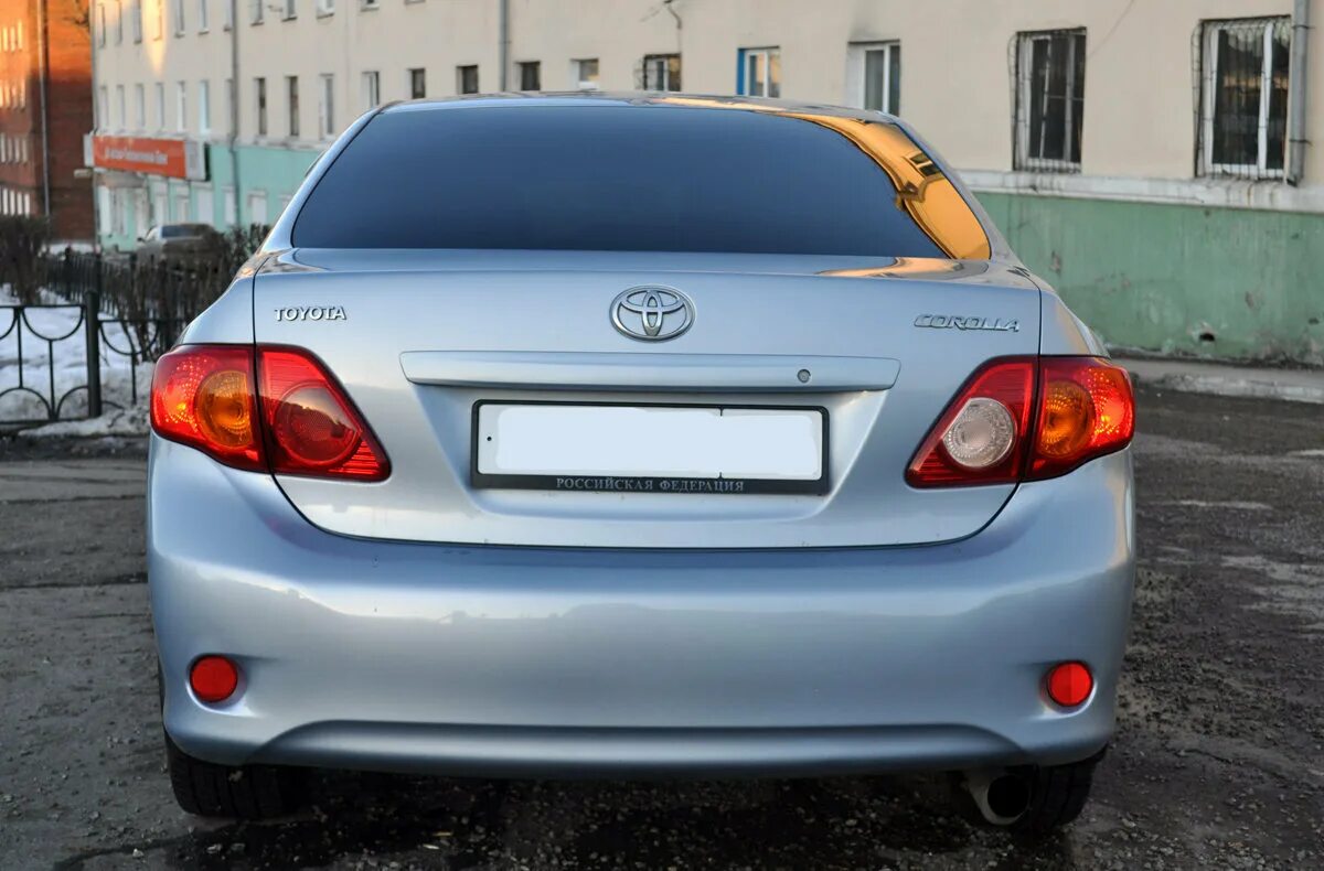 Задний диффузор для toyota corolla e150. Тойота королла 180 черный спойлер. Задни фары королла 2007 150. Бампер тойота королла е150. Corolla задни.