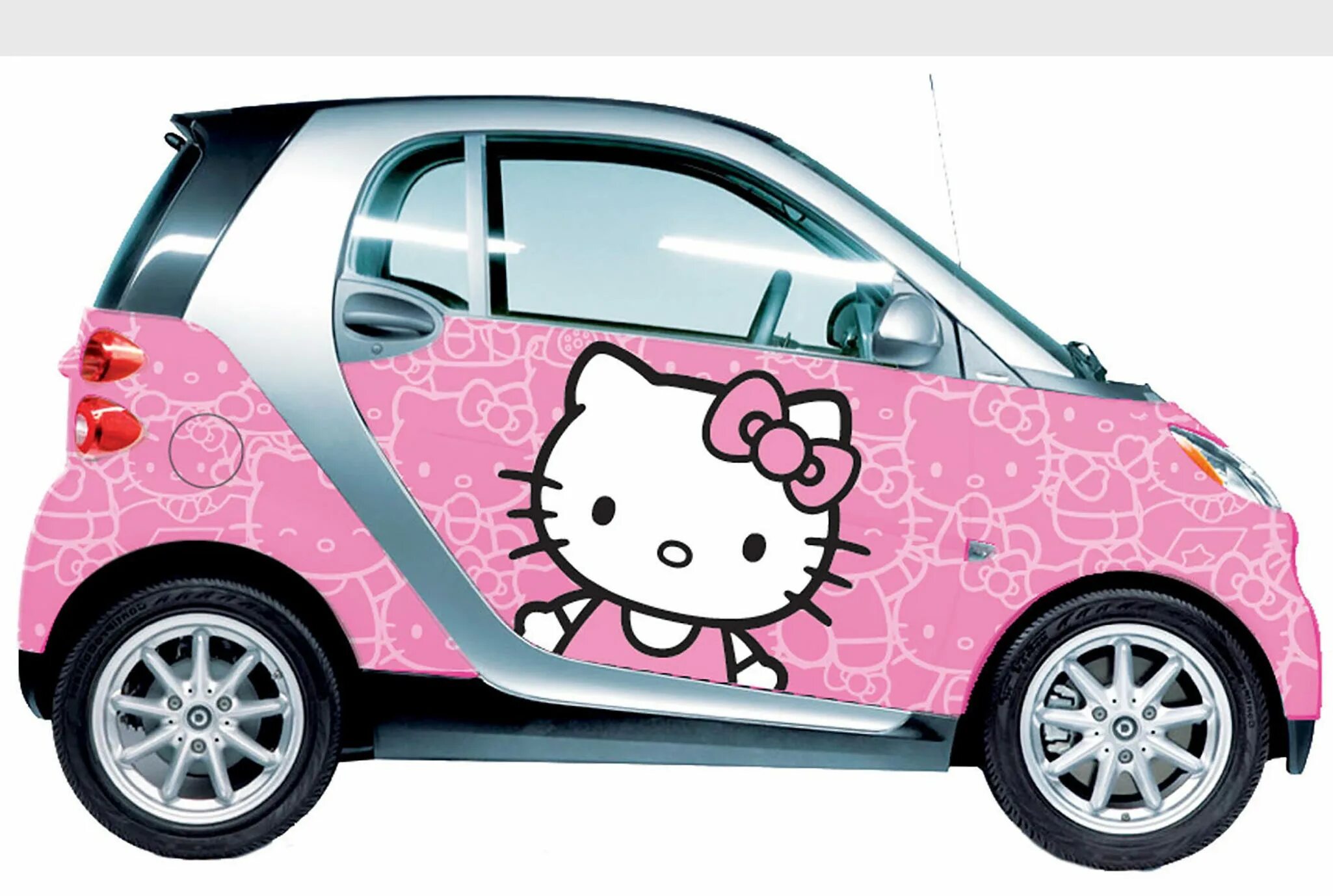 Машина хеллоу. Автомобиль Хелло Китти. Машинка hello Kitty. Машина с Хеллоу Китти. Розовая детская машина Хеллоу Китти.