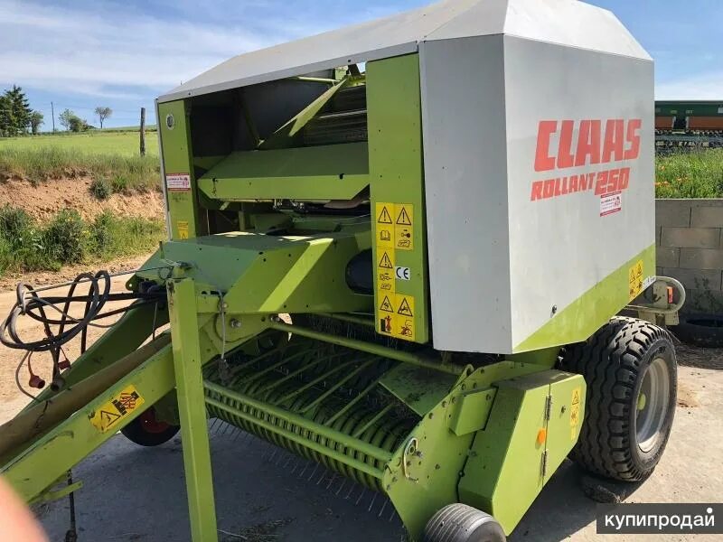 Подборщик claas. Пресс подборщик Rollant 250. Пресс подборщик CLAAS. Пресс-подборщик CLAAS Rollant 205. Пресс подборщик CLAAS Rollant 350.