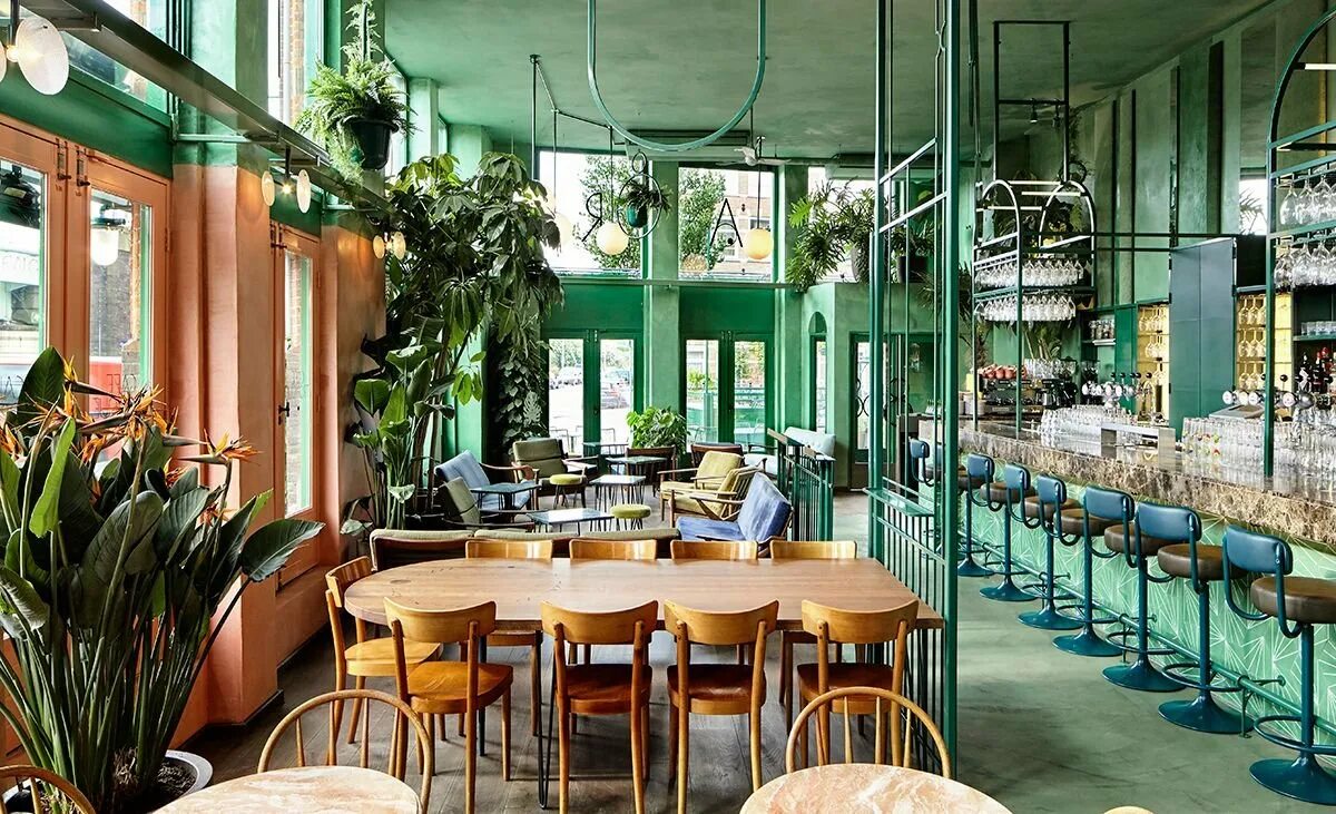 Ресторан Грин Вуд. Кафе с растениями. Кафе с зеленым интерьером. Растения в ресторане. Зеленое кофейня