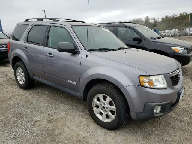 Mazda tribute 2012. Трибьют 2008. Джип мазда трибьют. Mazda tribute 2012. Мазда трибьют 2008 года.