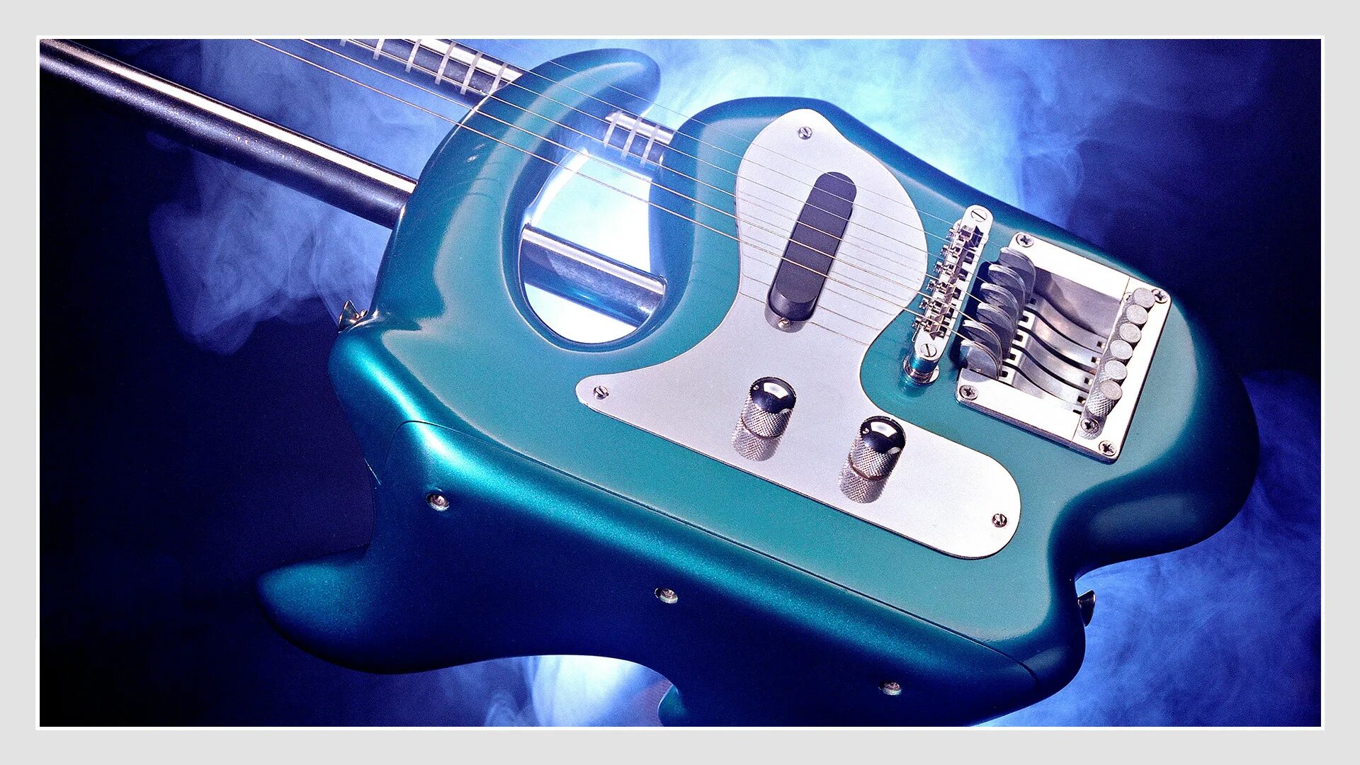 Гавайская электрогитара lap steel мэфми. Гавайская электрогитара ссср. Лэп стил гитара мензура. Лэп гитара. Самая большая гитара.