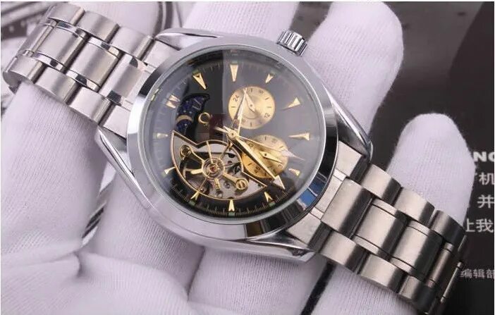 Watch 9 реплика. Часы Omega w7579. Часы Омега Stainless Steel back Water Resistant. Часы Омега скелетон мужские. Часы Rolex Stainless Steel Skeleton.