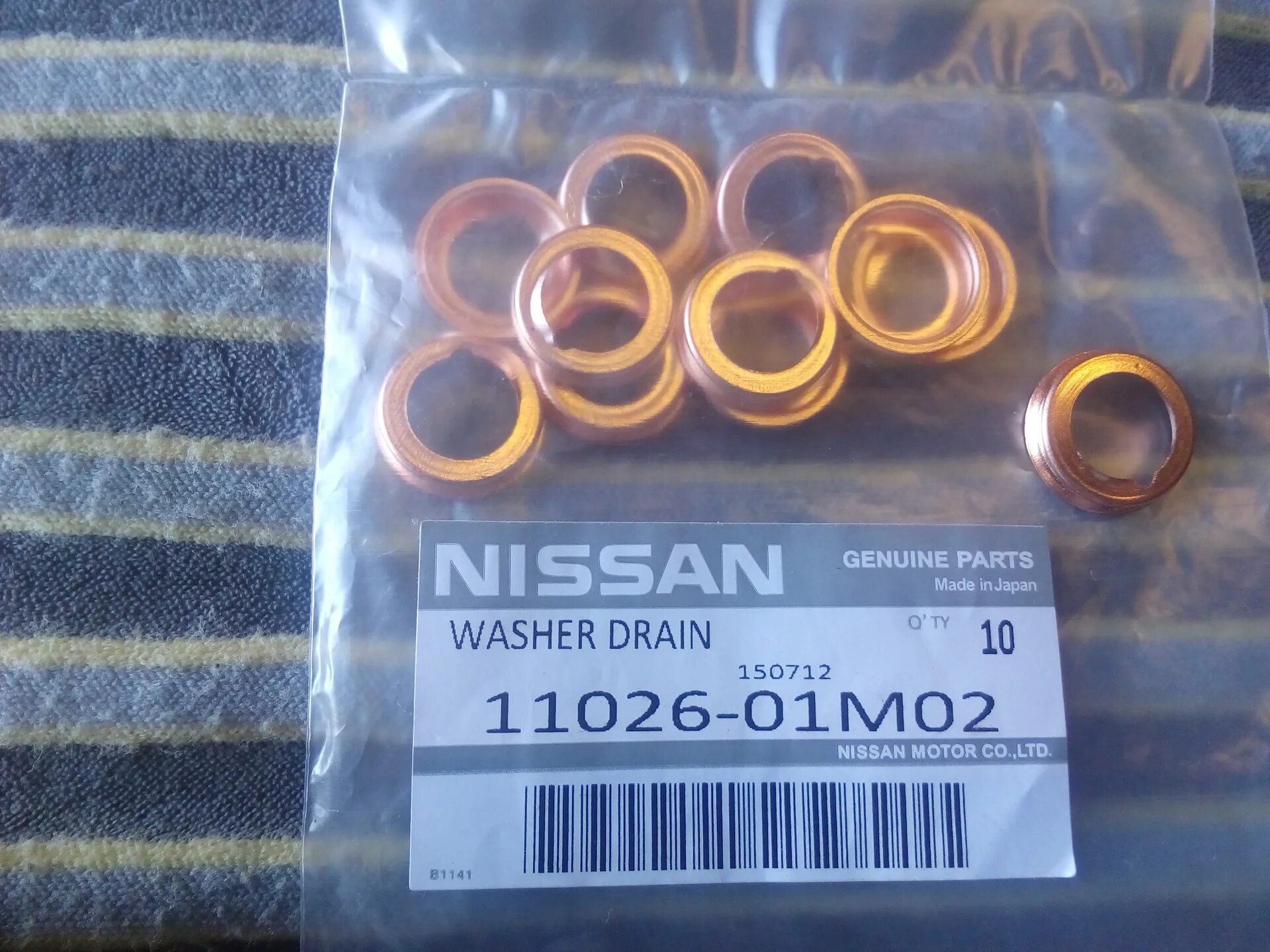 Прокладки пробки поддона двигателя. Nissan 1102601m02 шайба сливной пробки. 1102601m02 nissan прокладка. медная шайба пробки поддона ниссан кашкай j10. 1102601m02 nissan.