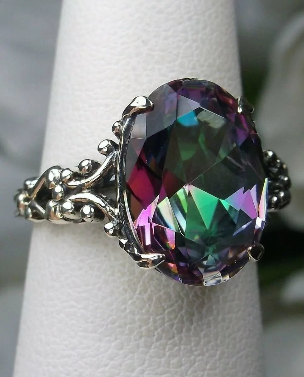 Камни мистики. Мистик топаз. Радужный топаз. Конго мистик топаз. Мистик топаз камень.