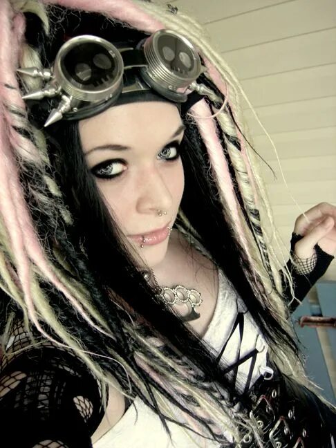 Goth kitty. Cybergoth. cyber goth with goggles. cyber goth tattoo.