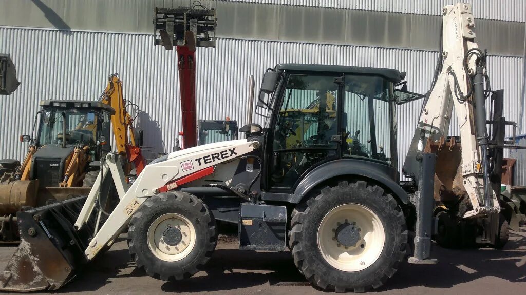 Экскаватор погрузчик 825. Экскаватор-погрузчик Terex 860. Экскаватор Терекс 860. Экскаватор-погрузчик Terex 820. Погрузчик Терекс 860.