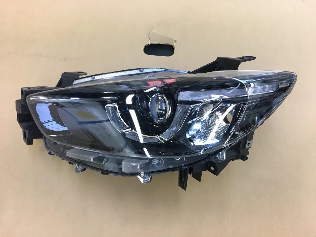 Фара мазда cx5. Передняя фара Mazda CX 5. Mazda cx5 2014 фара. Фары на мазду cx7. Мазда сх5 с led фарами.