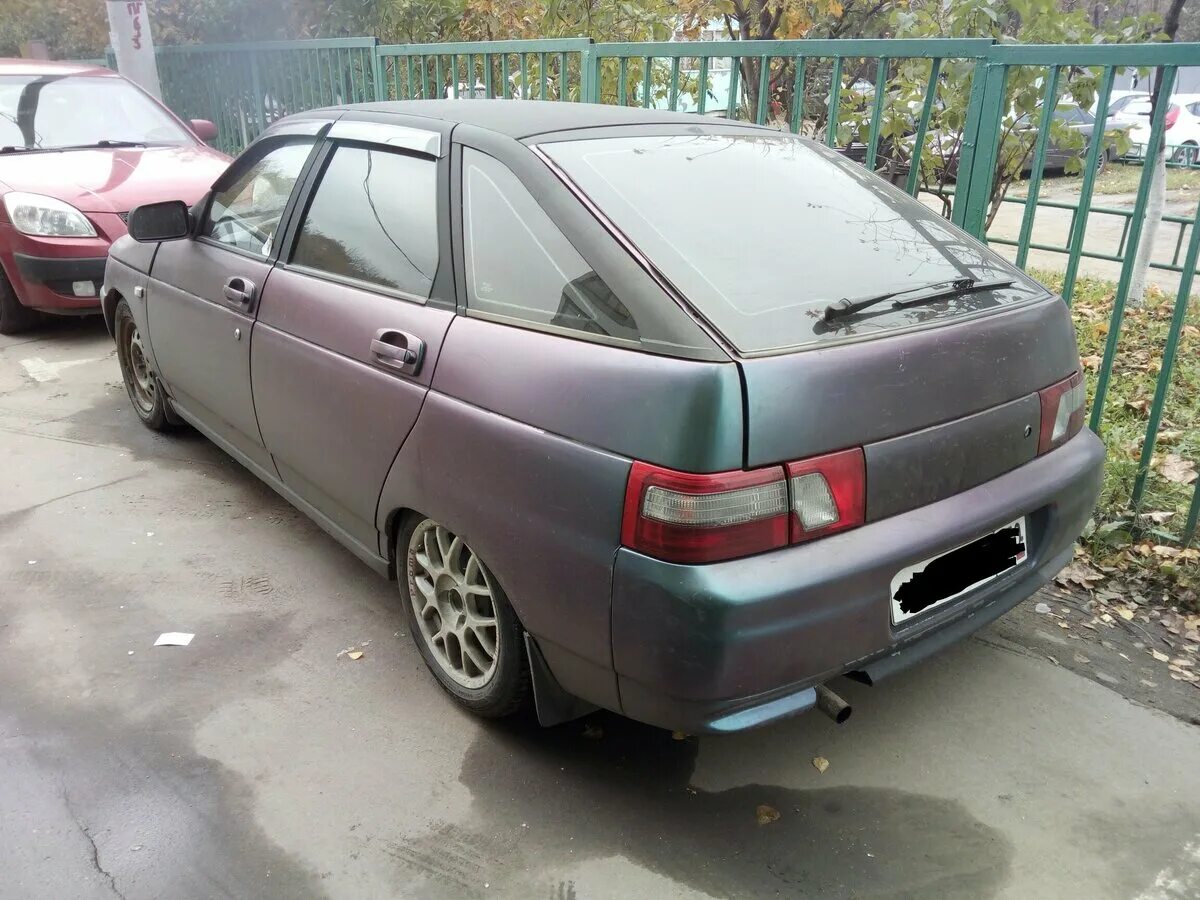 Ваз 2112 гвр фиолетовая. Ваз 2112 черная в оклейках. Ваз 2112 задние фонари кварц. Ваз 2112 серебристая тонированная. Машина не едет ваз 2112.