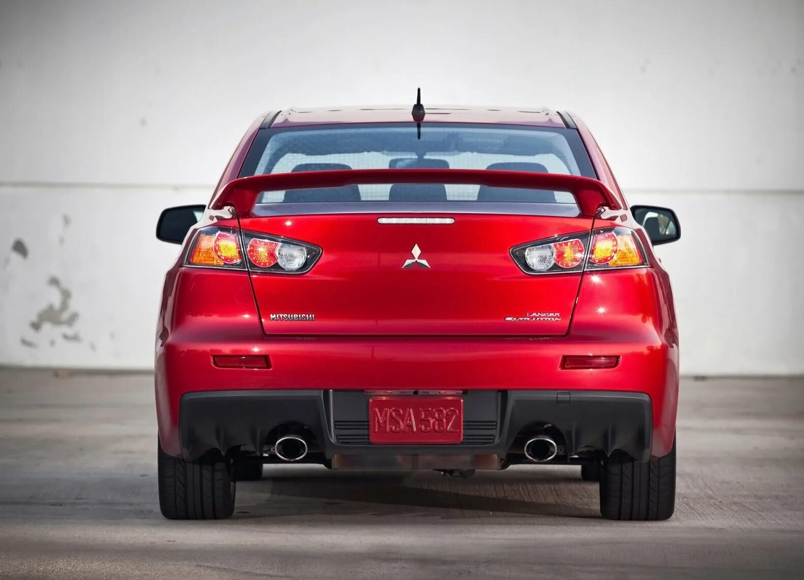 Как выглядит зад. Mitsubishi lancer evo 2010. mitsubishi lancer evo 10 зад. митсубиси лансер эволюшн 12. mitsubishi lancer evolution x 2010.