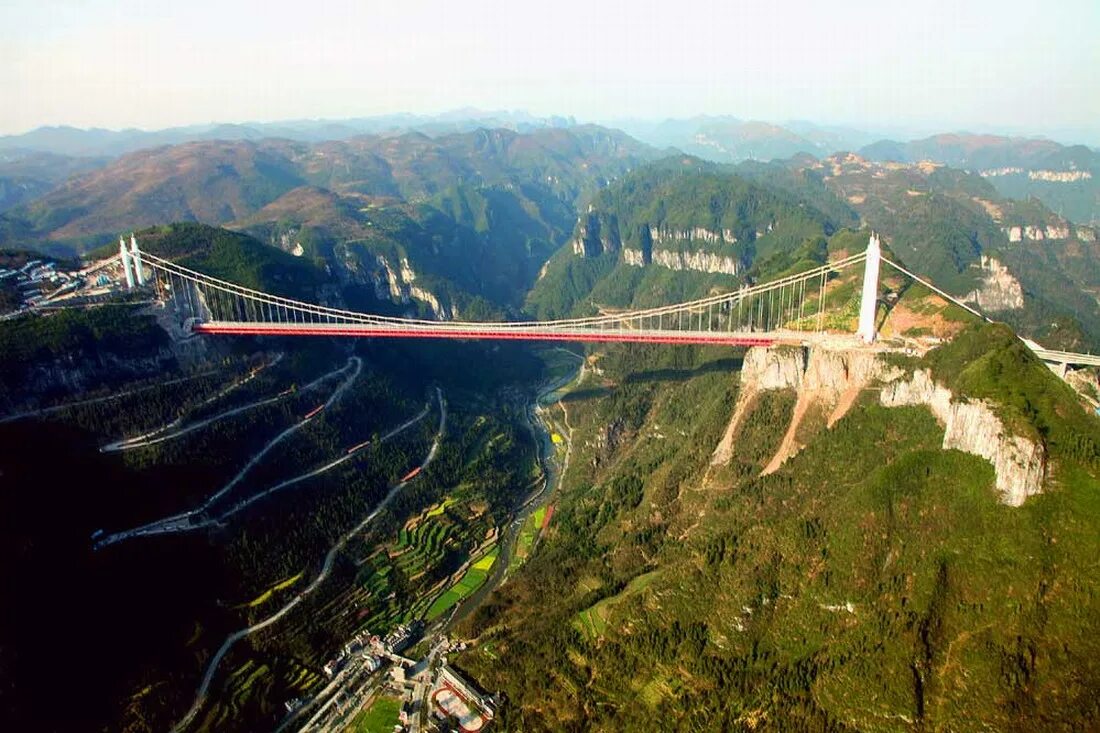 Самая длинная связь. Мост айчжай Китай. Айчжай Китай подвесной. Подвесной мост айчжай. Магистраль Чунцин-Хунань.