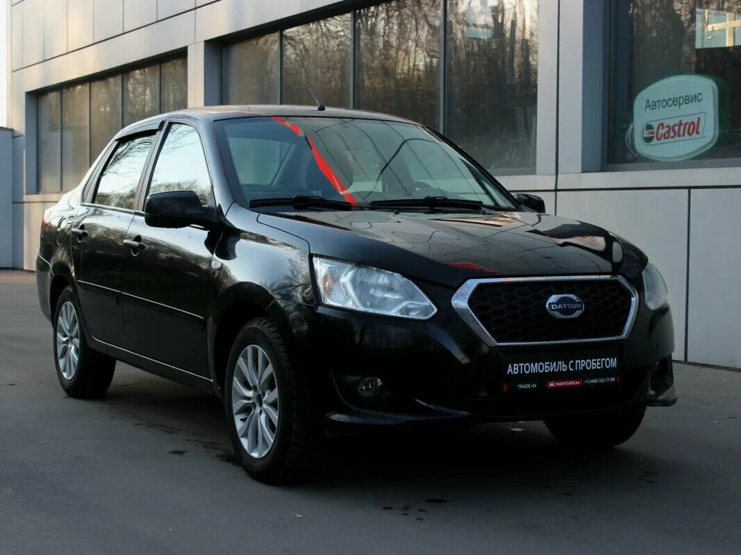 Датсун 2014 год. Дацун чёрный Datsun. Черный Датсун он до. Датсун машина 2014. Datsun on-do 2014.