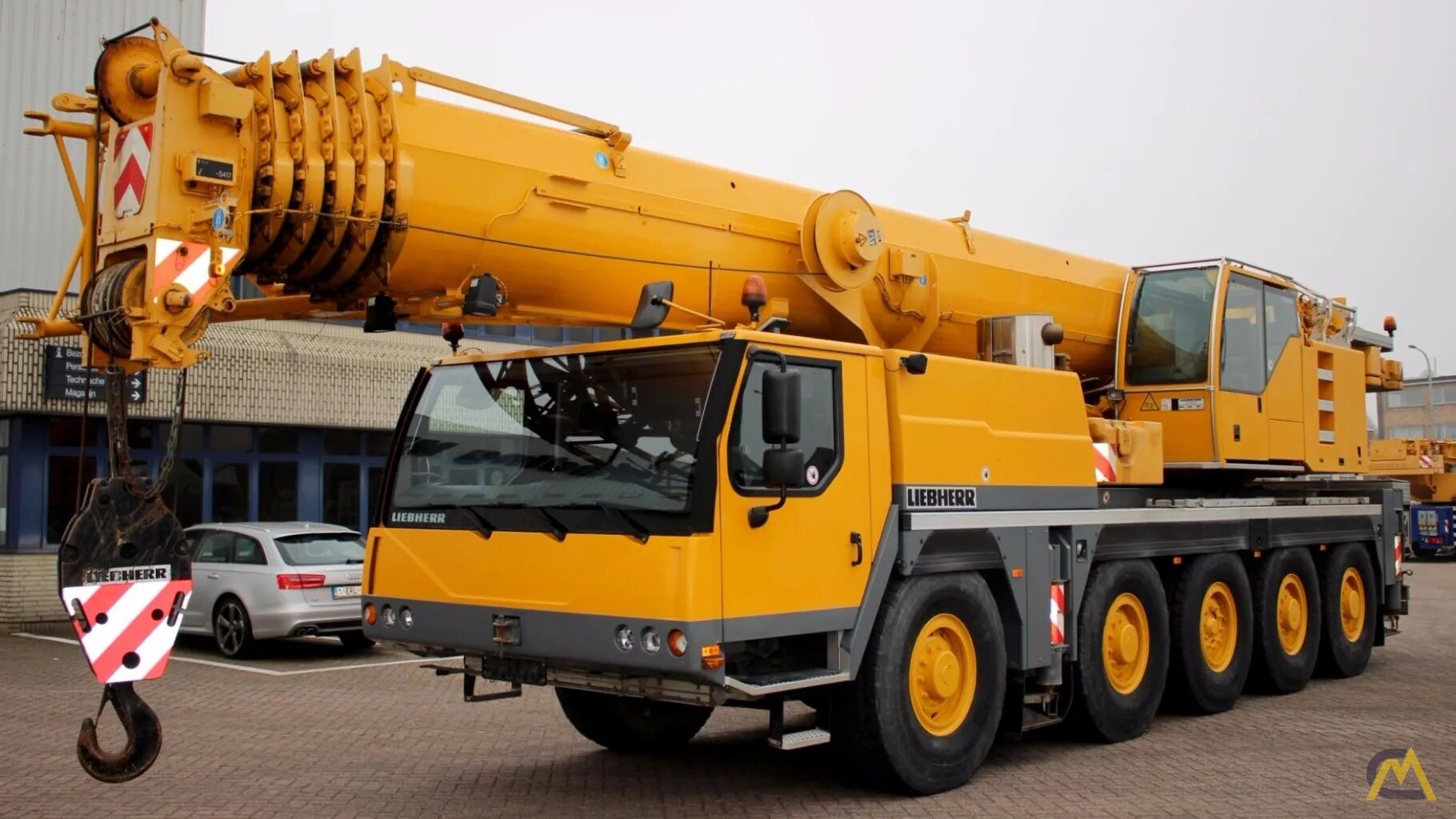 Кран liebherr ltm 1150. 150 тонов. Либхер 150 тн. Короткобазный кран xcmg rt70e. 1.
