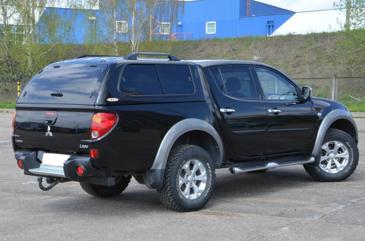 Черный л 200. Митсубиси l200 черный. Мицубиси л200 черный. Mitsubishi l200 4. Мицубиси Эль 200.