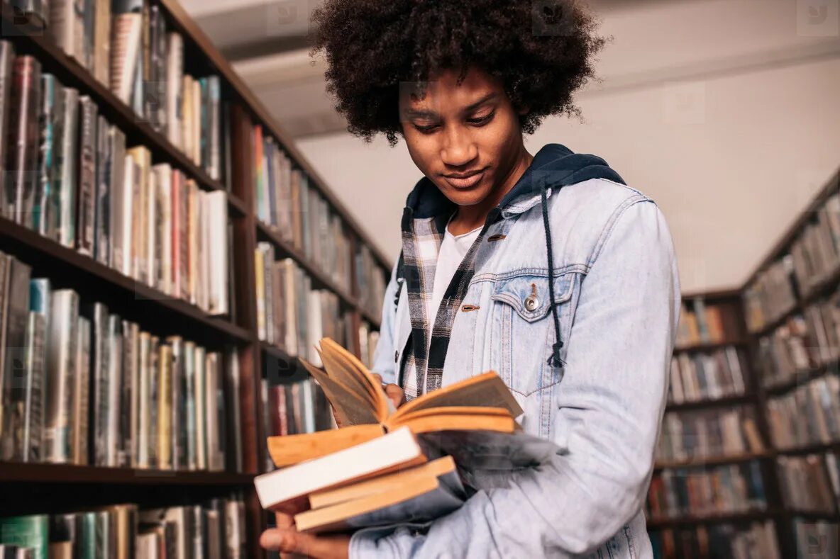 Книга из университета. Student look for study. Reading Stand for Schools. University notre Dame girl in the Library. She a lot of books