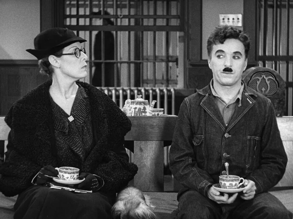 Чарли чаплин modern times. Новые времена комедия. Charlie chaplin paulette goddard. Новые времена комедия. Чаплин modern times.