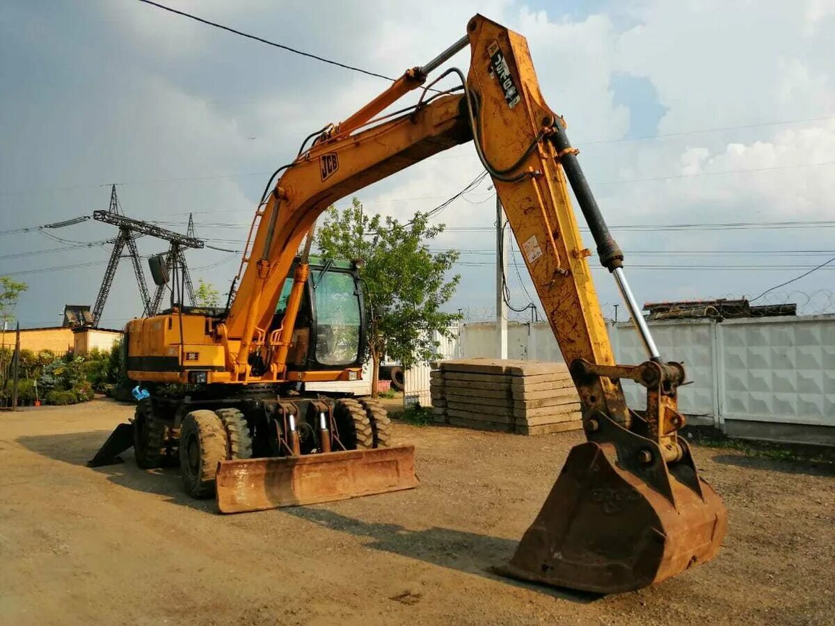 Купить экскаватор владивосток б у. JCB js160w. Колесный полноповоротный экскаватор JCB js160w. JCB 160 колесный. Колёсный экскаватор полноповоротный JCB 160.