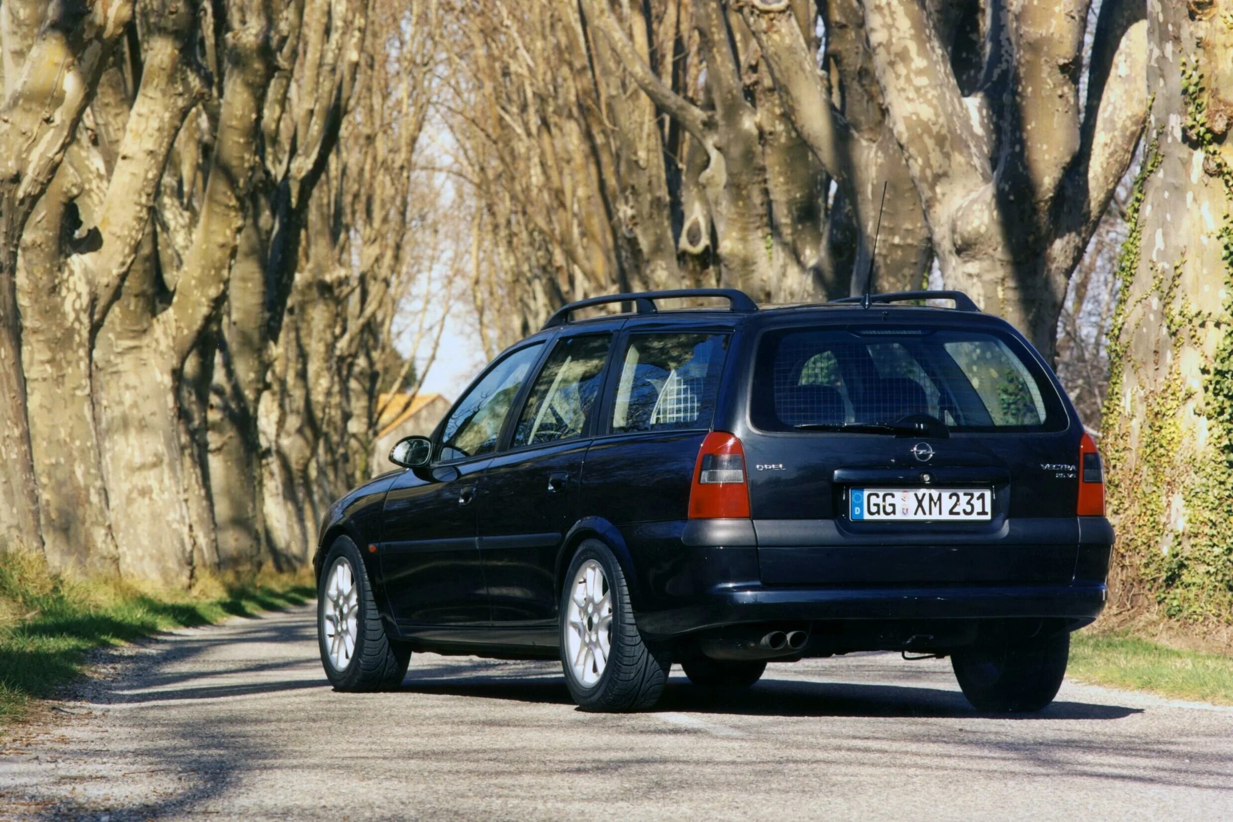 Опель вектра караван. Opel Vectra b универсал 1999. Opel Vectra универсал 1999. Opel Vectra Caravan. Опель Вектра 1999 универсал.