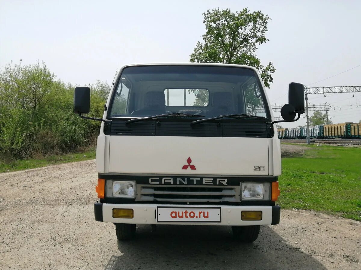 Кантер 1990 года. Mitsubishi fuso 1990 грузовой бортовой с манипулятором. Митсубиси фусо о888тр22. Митсубиси кантер будка 1. Мицубиси фусо 1985 года.